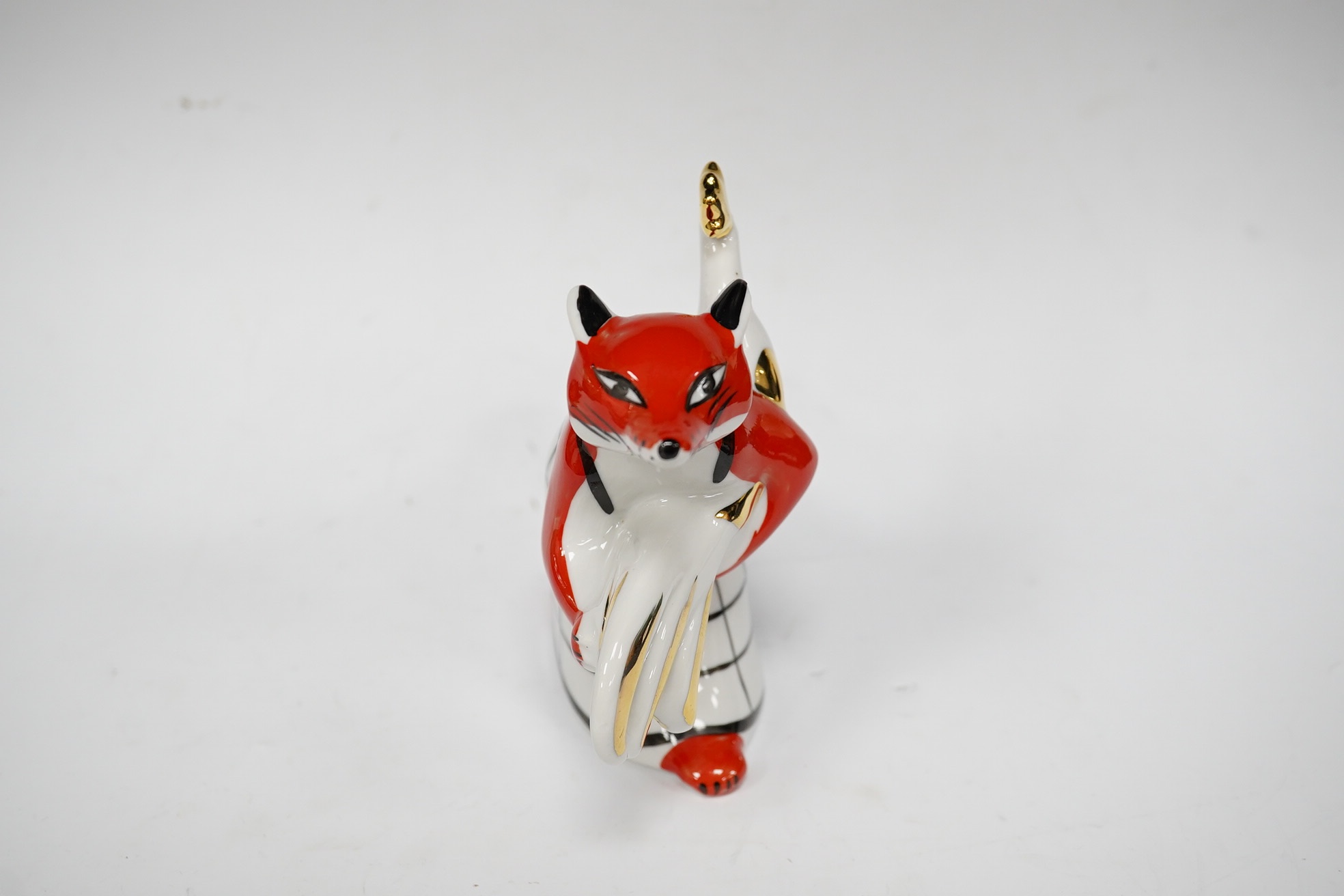 A Russian porcelain fox and rooster figure, stamped to the base, 18cm wide. Condition - good